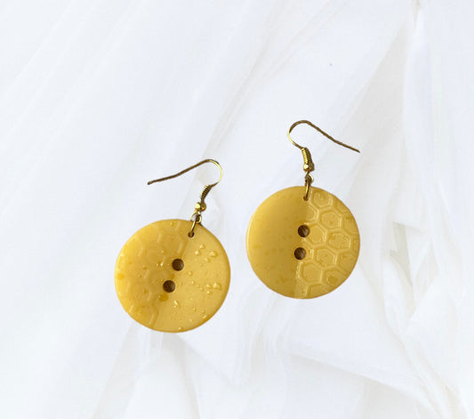 Boucles d’oreilles boutons moutarde
