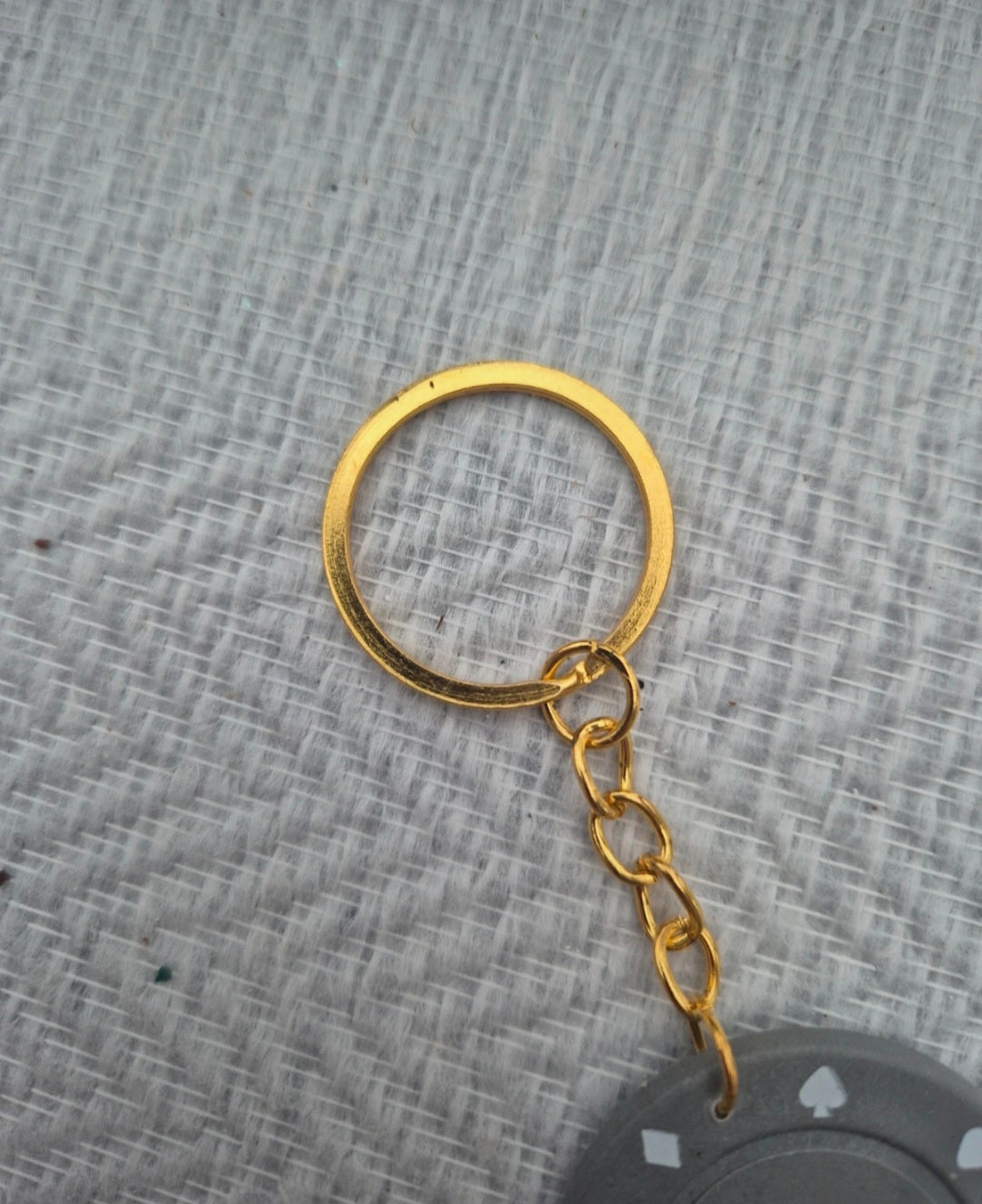 Porte clé jeton de Poker gris