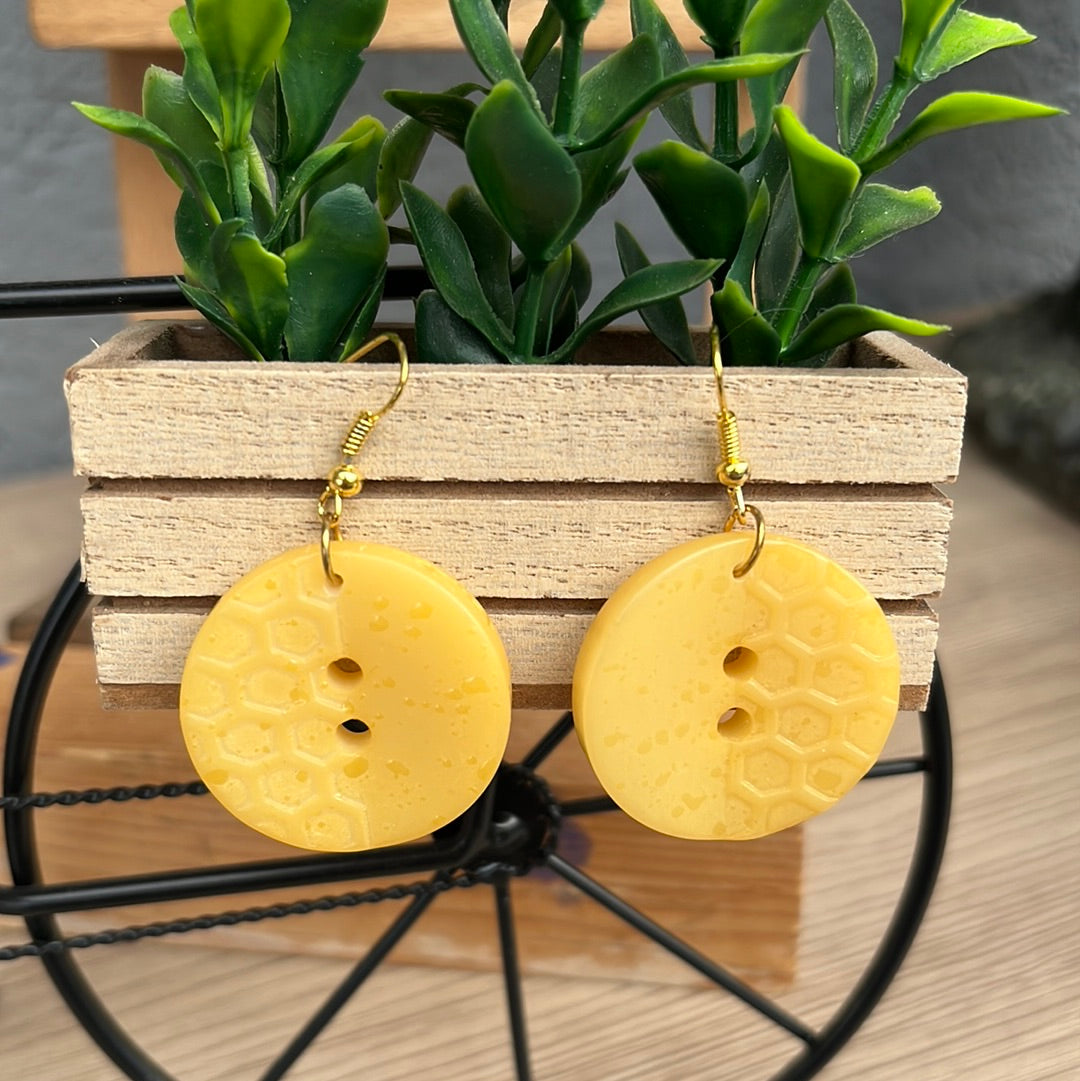 Boucles d’oreilles boutons moutarde