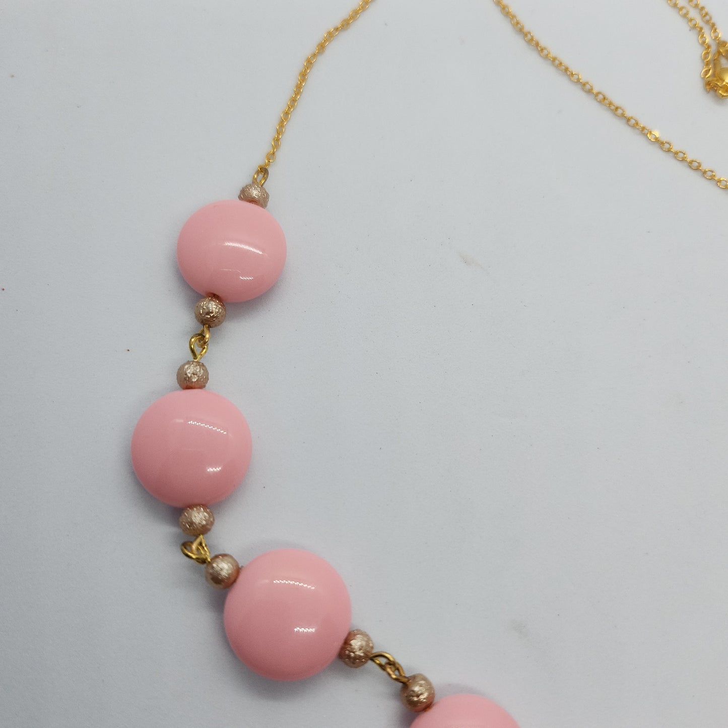 Collier rose et doré